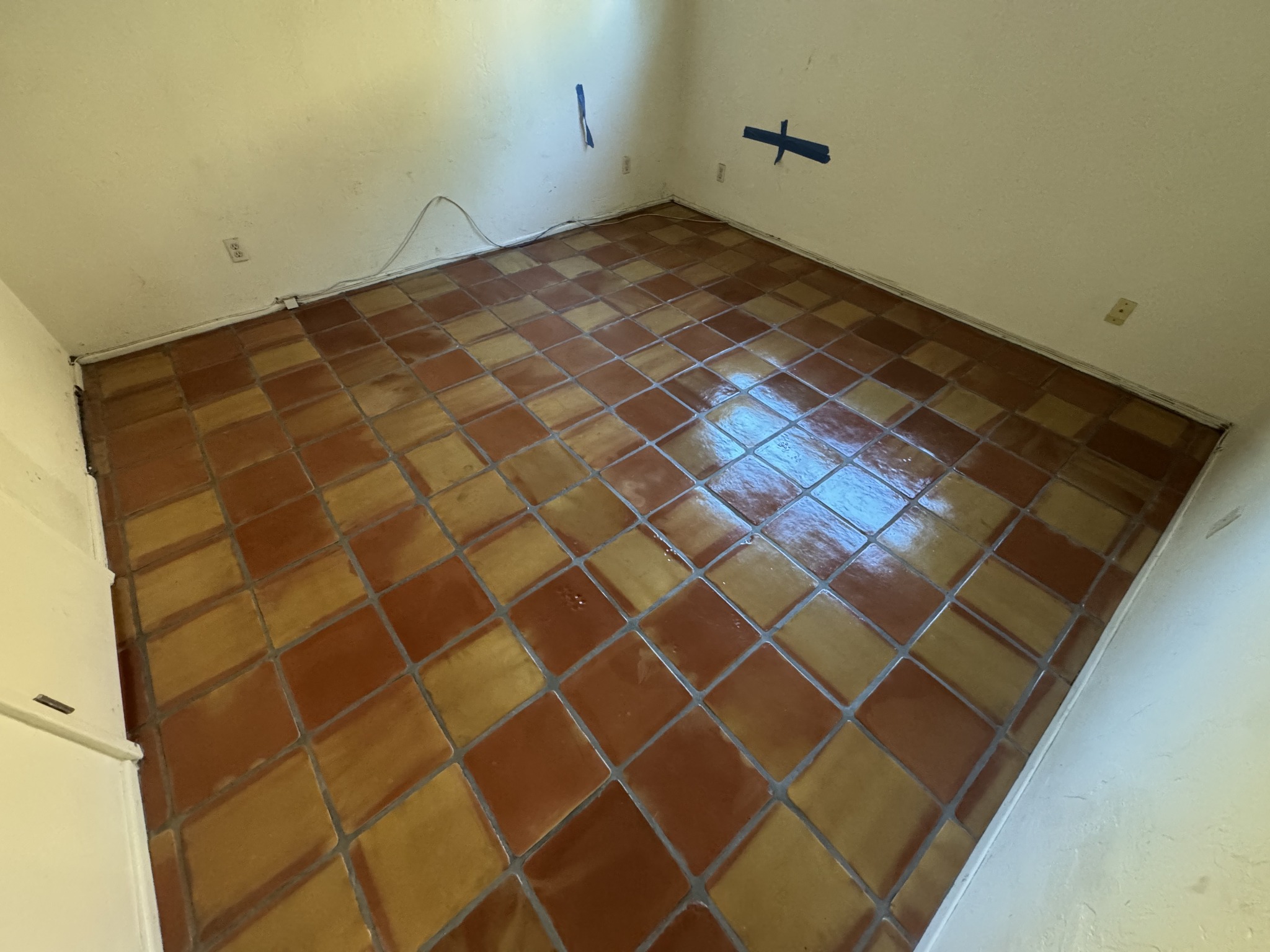 Room overview showing the natural variation of installed Saltillo tiles